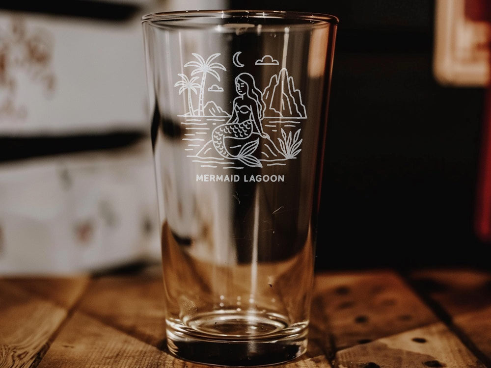 Mermaid Lagoon Pint Glass: Engraved Nautical Ocean Scene