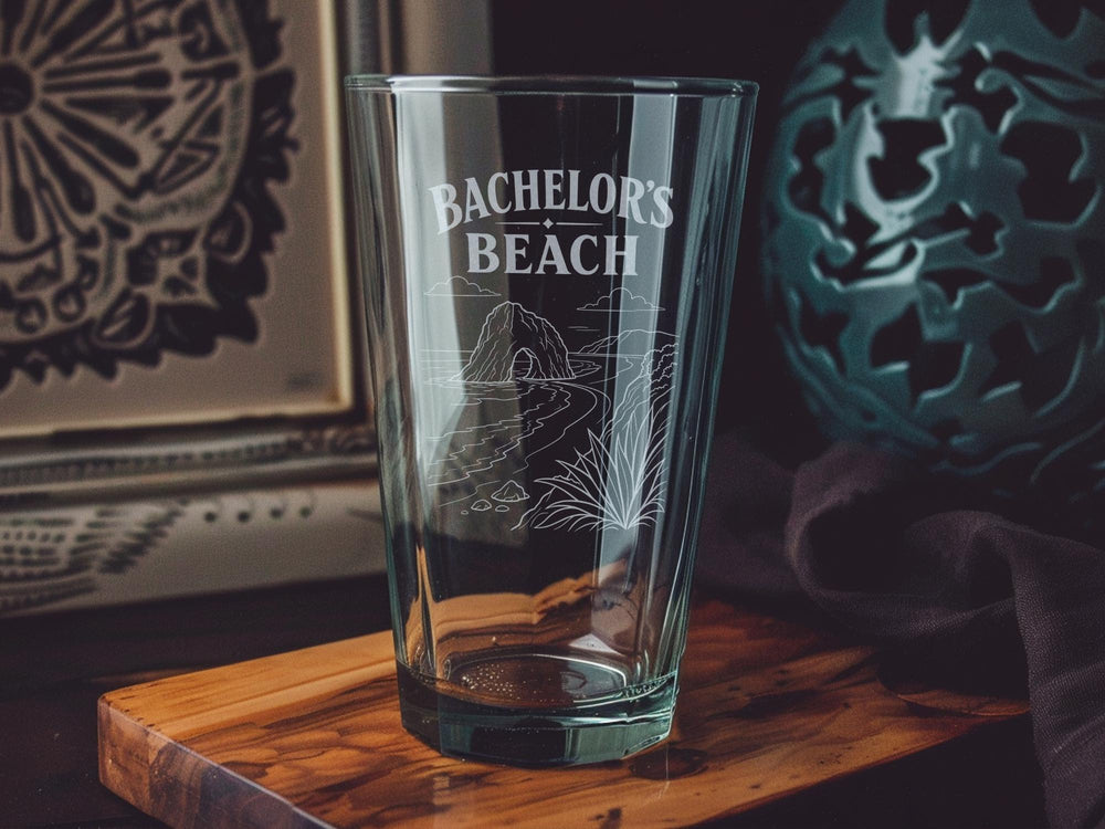Bachelor’s Beach Pint Glass, Beach Lover Gift, Coastal Vacation Souvenir, Seaside Drinking Glass, Ocean Beach Theme Barware