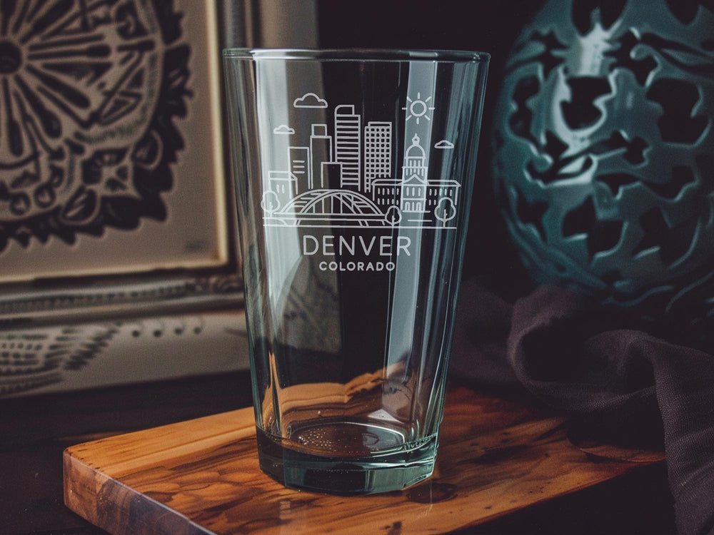 Denver Colorado Pint Glass – Featuring Rocky Mountains, City Skyline, and Iconic Landmarks Design